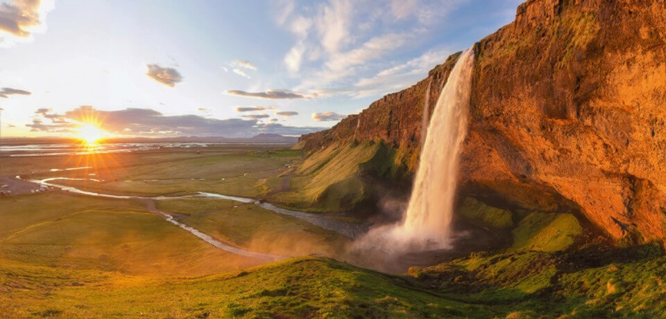 Planet earth on green grass - Iceland nature protection measures