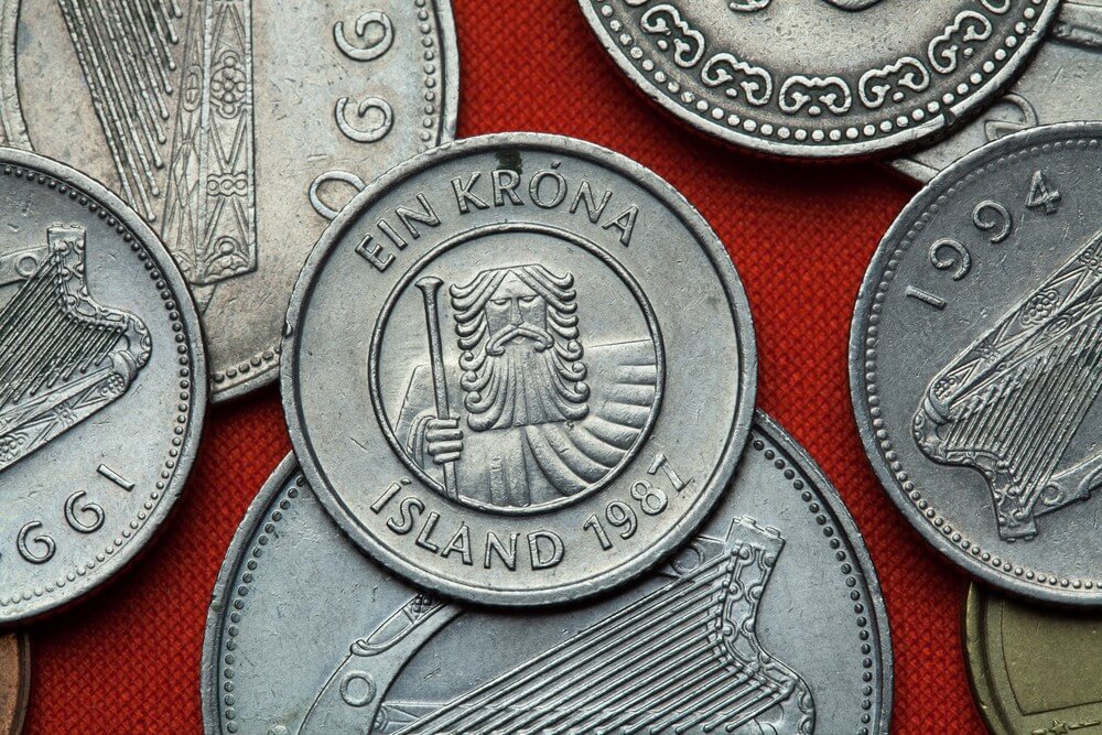 One krona coin and other icelandic currency